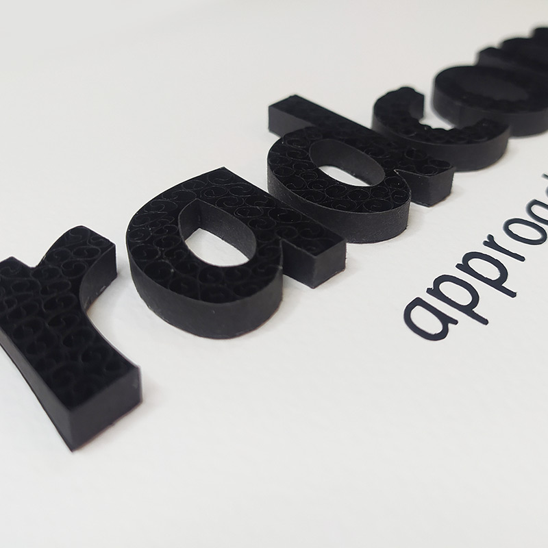 Radcom Company Paper Quilling Logo
